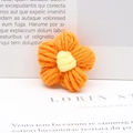 DIY handmade crochet milk cotton flower accessory in vibrant orange and yellow colors - Orange