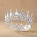 Close-up of silver bridal crown featuring shimmering colorful crystals and drop-shaped gems - Silver Base + AB Rhinestone