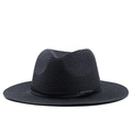 Detailed view of black woven panama straw hat with a matching ribbon and leather accent - Black