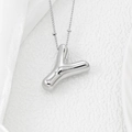 Macro view of 3D bubble letter Y pendant in silver finish with delicate bead chain - Letter Y Pendant