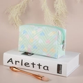 Light green PVC makeup bag with colorful heart patterns and secure zipper closure - Green