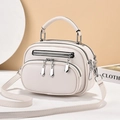 White minimalist crossbody bag with multi-layer zippers and lychee texture finish - White