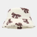 Detailed close-up showing soft plush faux fur texture and coffee brown bow patterns - M (56-58cm) / Beige (Coffee Butterfly)