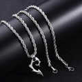 Close-up of polished stainless steel heart pendant on a twisted rope chain necklace - Silver Magatama Pendant (Rope Chain)