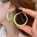 Minimalist neon green geometric hoop earrings worn to show style and large size - Green Ring