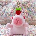 Pink capybara plush keychain with fruit headband and gold metal hook accessory - Pink Apple Style + Gold Clip