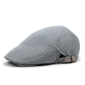 Detail view of the breathable grey mesh fabric and metal adjustment buckle on the hat - Light Gray