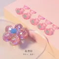 Gros plan sur le socle fleur rose pailleté et supports magnétiques pour art de l'ongle - 1 Base + 5 Supports / Rose Aurore
