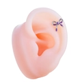 Elegant purple bow titanium steel ear stud displayed on a silicone ear model - Purple (Single Piece)