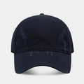 Macro shot of distressed navy blue washed cotton fabric and vintage frayed brim details - Navy Blue