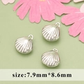 Three silver seashell charms with star detail for DIY necklace and earring making - Silver Shell
