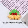DIY Christmas resin bell accessory with holly leaves and red bow for craft decoration - Christmas Bells