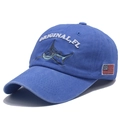Vintage washed blue cotton baseball cap featuring shark embroidery and USA flag patch - Adjustable / Blue
