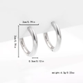Detail view of silver C-shaped hoop earrings showing 2cm size and 6.3g weight details - Silver