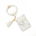 Silicone bead key ring bracelet with marble print leather card wallet and gold tassel - Marble