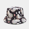 Detailed pattern of a black reversible bucket hat featuring cute cartoon balloons and bunnies - Black Hot Air Balloon Rabbit Print