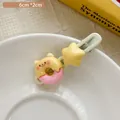 Rosa und gelbe Donut-Haarklammer mit Stern-Detail, Größe 6 cm x 2 cm für Mädchen - Donut Bär Haarspange