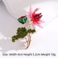 Elegant gold lotus brooch with pink enamel petals and sparkling crystal accents - Lotus Flower