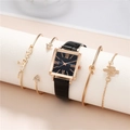Close-up of gold square watch with black leather strap and four matching gold bracelets - Watch + Bracelet Set / Black