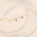 Elegant gold stainless steel bracelet with colorful floral charms and blue beads on marble - Three Flowers Pendant Style(8#)