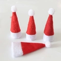 Set di quattro mini cappelli di Babbo Natale rossi e bianchi per lecca-lecca e decorazioni - Rosso/Bianco