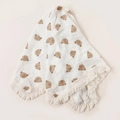 Detail of white cotton baby blanket with brown bear prints and decorative tassel trim - 100*120 cm / Bear