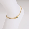 Gouden dubbellaagse enkelband met oneindigheidssymbool en evil eye bedel aan de voet - Blauwe Enkelband
