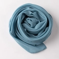 Detail of gray-blue chiffon scarf folded into a rose showing fine rolled hem and soft texture - 90*90cm / Aquamarine