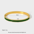 Detail of 18k gold plated bangle with green rectangular zircons and 58mm inner size - Green