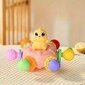 Yellow chick baby rattle toy with colorful sensory loops and a pink base for teething - Dinosaur Ball - Pink