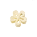 Detail of a matte cream yellow flower hair claw clip with a hollow five-petal design - Hollow - Cream White