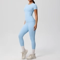 Detailed side view of high-elasticity blue yoga set with t-shirt and high-waist leggings - S / Sky Blue