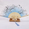 Japanese style bamboo folding fan featuring blue white gradient with plum and butterfly - White Ribs Style 23