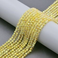Macro shot of 4mm yellow faceted crystal glass beads with iridescent sparkle finish - 4mm (Approx 98pcs/Strand) / Bright Gold