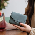 Slim genuine leather bifold wallet in Morandi green with envelope flap and card slots - Almond Green