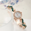 Women's rose gold quartz watch with dark green enamel and rhinestones on crystal stand - Green