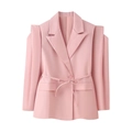 Detailed view of padded shoulders and waist tie on a pink tailored women blazer - S / Pink