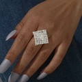 Macro shot of a sparkling square pavé ring with white crystals on silver metal band - Adjustable Open / Silver Square Style (6021S)