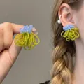 Detailed view of handmade beaded tassel earrings with blue flower and green fringe - Green (14# Silver Pin)