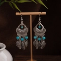 Detail of bohemian silver earrings with blue turquoise beads and leaf charms - Sky Blue Beaded Hollow Feather Pendant Style (E7666)