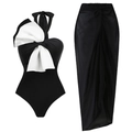 Detail of one-piece swimsuit with large white bow and sheer black beach sarong skirt - S / 2-Piece Set (Swimsuit + Sarong)