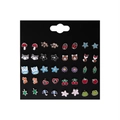 Set di orecchini con animali e frutti con modelli di funghi, coccinelle e gufi su carta - Set Smalto Piante Animali della Foresta