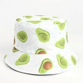 Close-up of cotton bucket hat with cute cartoon avocado pattern and reinforced stitching - Smiley Avocado White