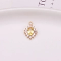 Sunflower charm pendant in gold finish with yellow oval stone and clear zircons - Gold Yellow