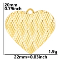 Detail view of a woven texture gold heart pendant with dimensions 20mm by 22mm - Pendant Only / Gold