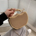 Khaki striped box bag with leopard handle and gold chain strap in hand - Khaki