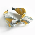 Bohemian silk-texture headband featuring yellow and grey horsebit belt pattern - Yellow Chain Bow