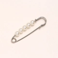 Detail of silver safety pin with five white faux pearls for waist adjustment - 5cm 5 Pearls Silver