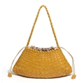 Handcrafted mustard yellow woven crossbody bag with classic leather weaving and drawstring - Amber Yellow