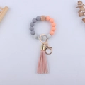 Portachiavi da polso con perle in silicone, nappe in pelle e perline arancioni e grigie - Rosa Acceso